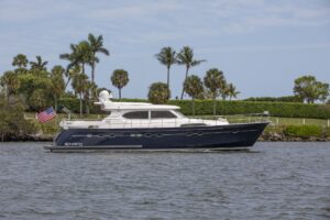 Elling E6 Highline yacht leaving the Palm Beach Show in Florida, showcasing luxury and craftsmanship